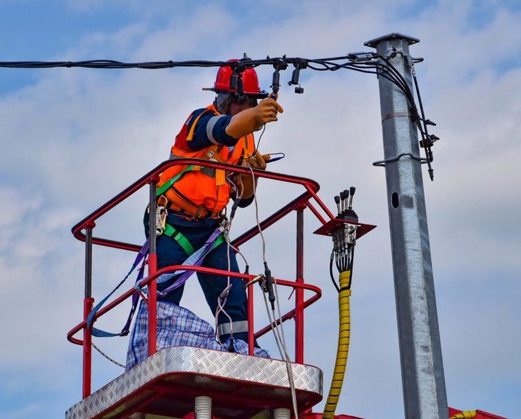 Electrical Lineman fixing electrical lines